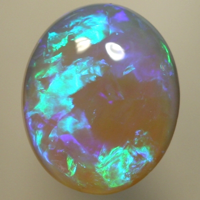 SOLID CRYSTAL OPAL Bright green and turquoise over a purple hue